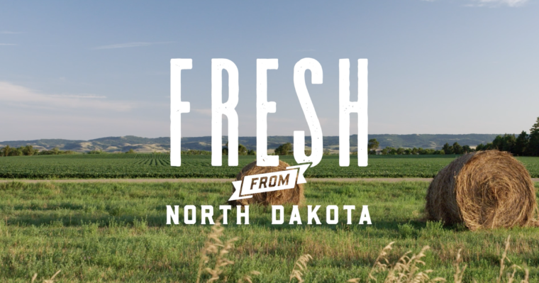 Picture of hay bales in field with Fresh from North Dakota Logo